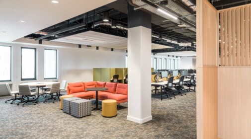 interior of refurbished office building showing collaborative meeting nook