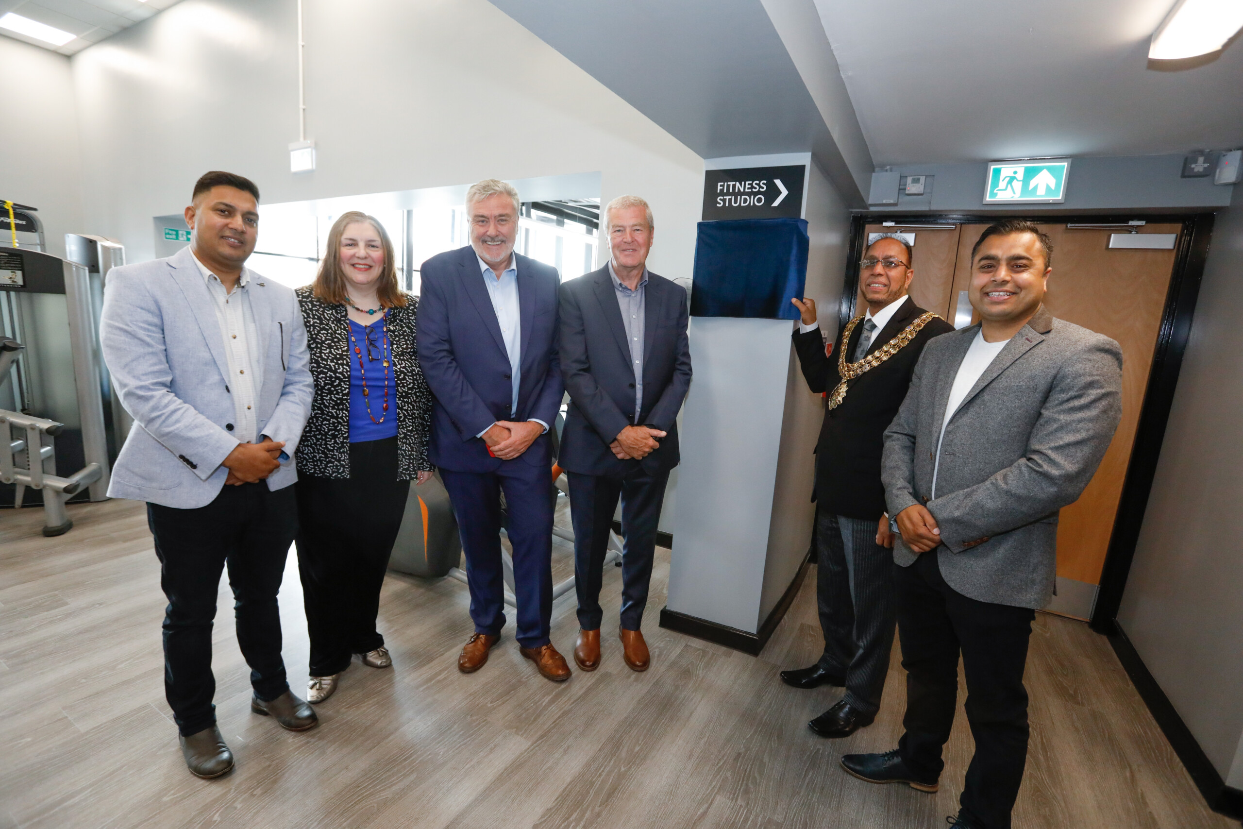 Image of Bolton Mayor and five other stakeholders at the opening of a refurbished leisure centre