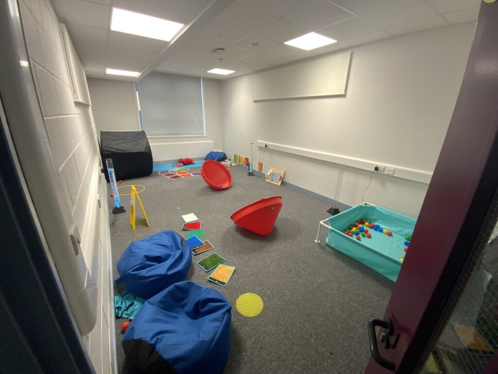 Image of interior of refurbished special educational needs school in Liverpool with toys and play items